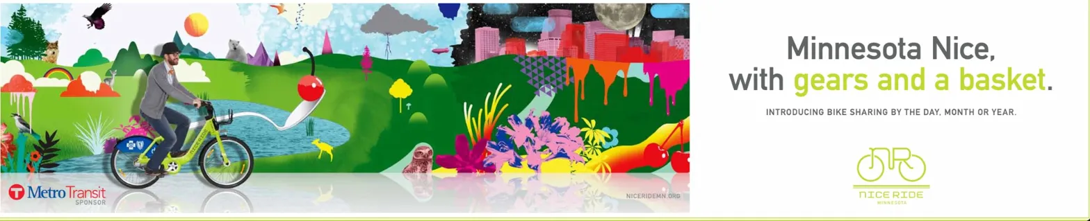 Bus shelter ad with illustrated Minneapolis landscape and rider