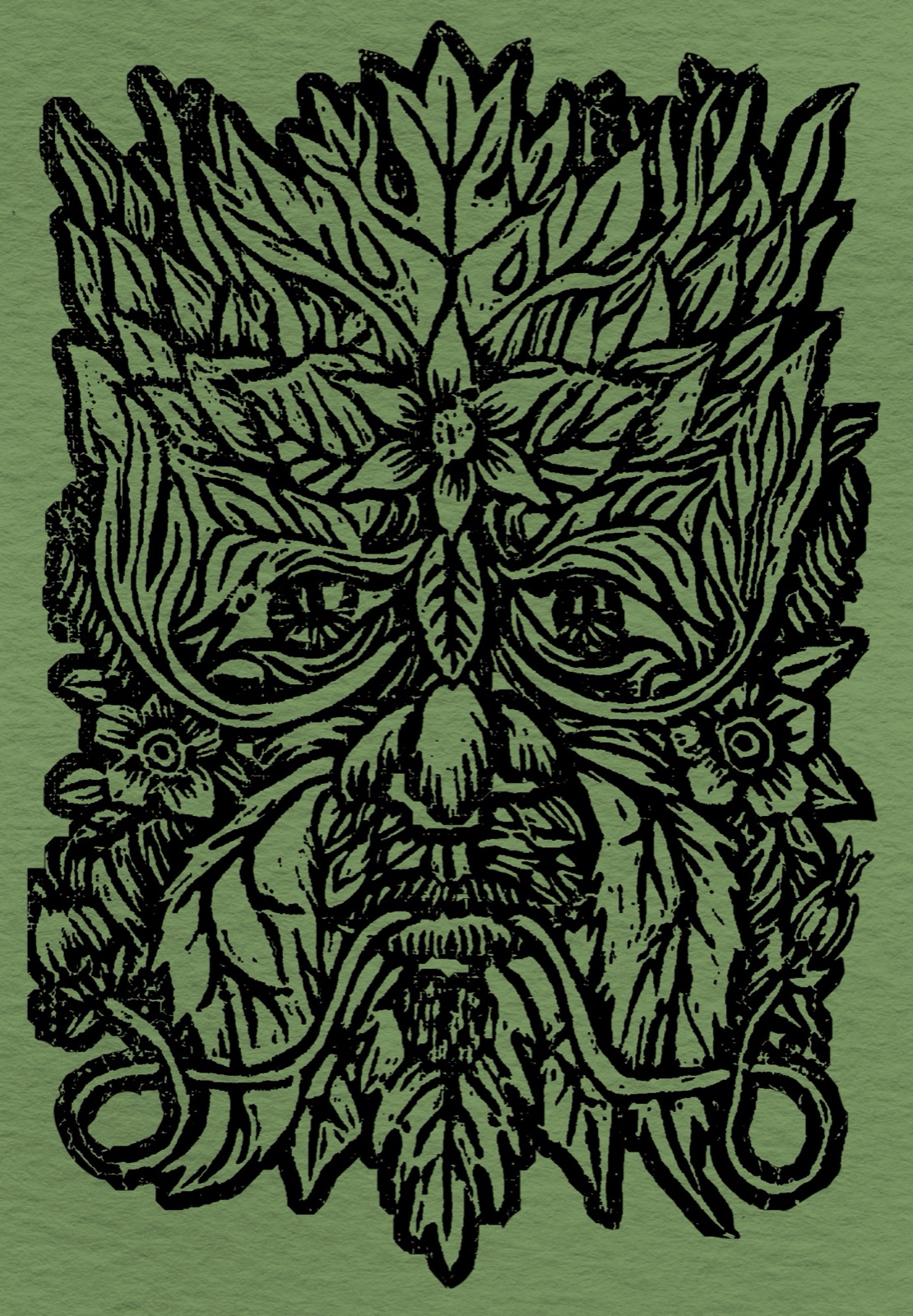 The Green Man: a face of layered leaves and flowers in bold black carved line, printed on green paper.